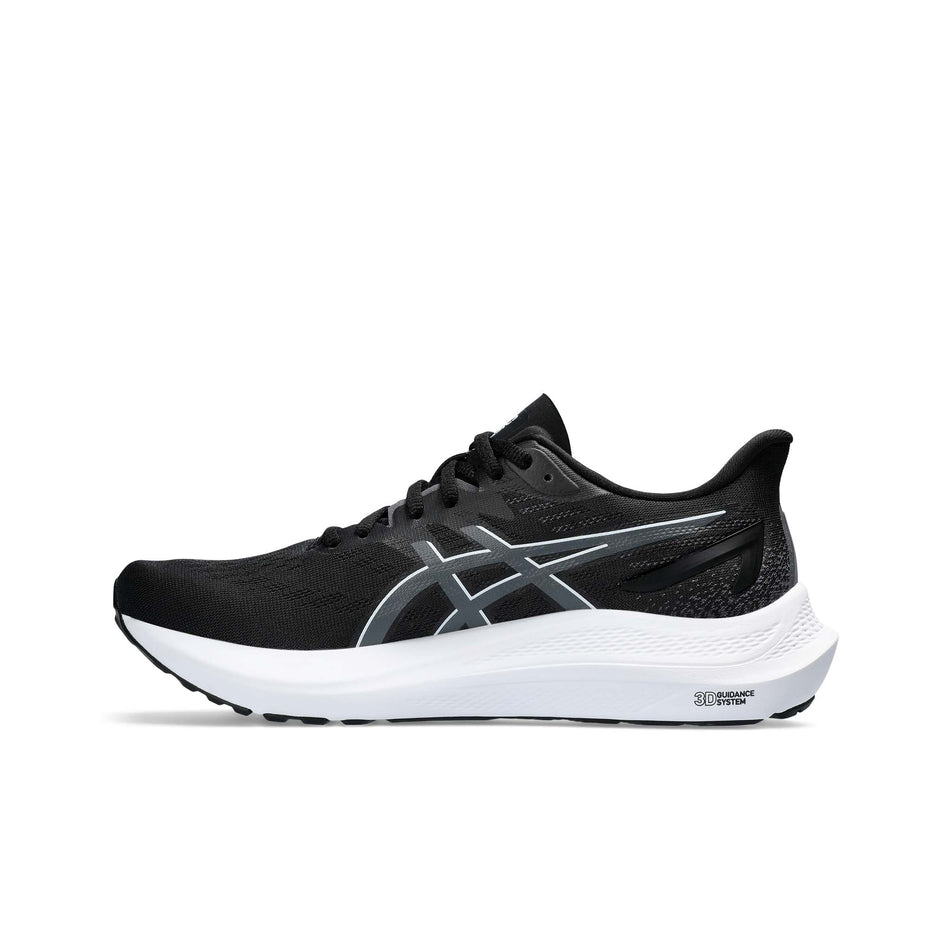 Medial side of the right shoe from a pair of Asics Women's GT-2000 12 Running Shoes in the Black/Carrier Grey colourway (8365865369762)