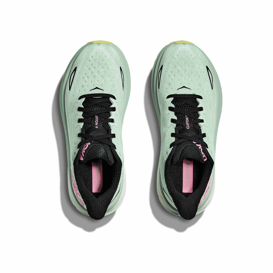 The uppers on a pair of HOKA Women's Clifton 9 Running Shoes in the Mint Fluorite/Snow Melt colourway. (8561679171746)