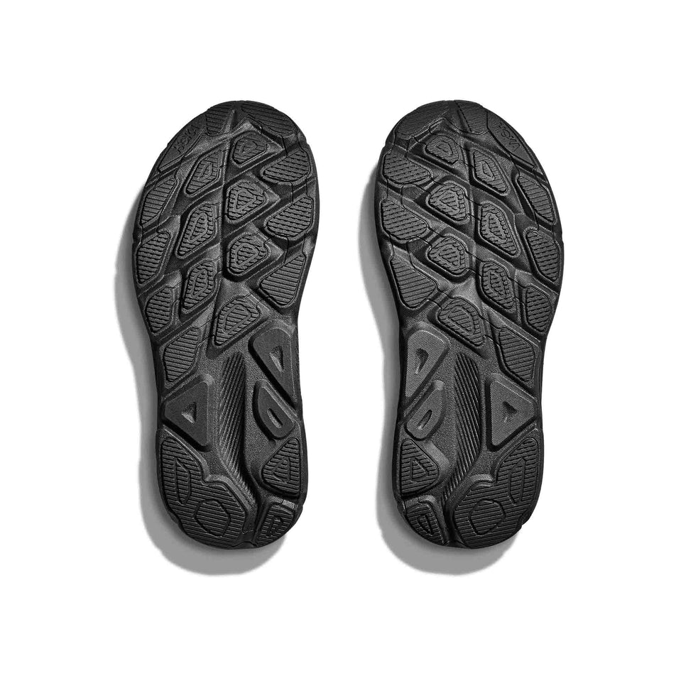 The outsoles on a pair of HOKA Women's Clifton 9 GTX Running Shoes in the Black / Black colourway. (8566991192226)