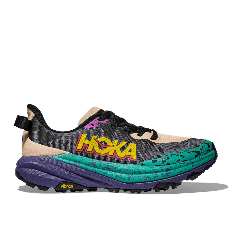 Lateral side of the right shoe from a pair of HOKA Women's Speedgoat 6 Running Shoes in the Oatmeal/Mountain Iris colourway. (8561697128610)