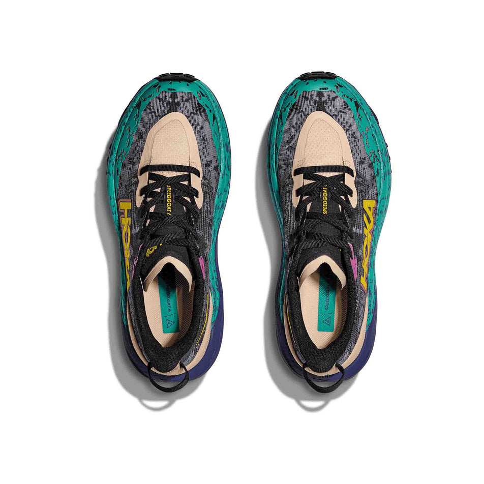 The uppers on a pair of HOKA Women's Speedgoat 6 Running Shoes in the Oatmeal/Mountain Iris colourway. (8561697128610)