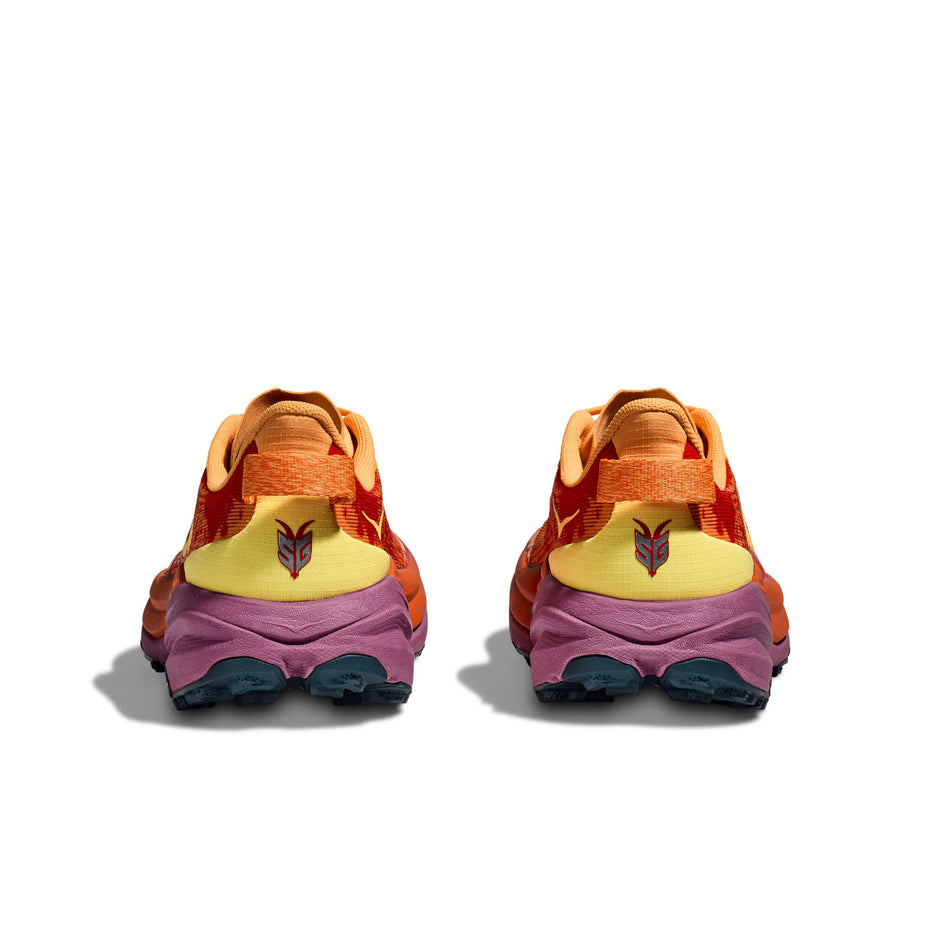 The back of a pair of HOKA Women's Speedgoat 6 Running Shoes in the Sherbet/Beet Root colourway (8339260539042)