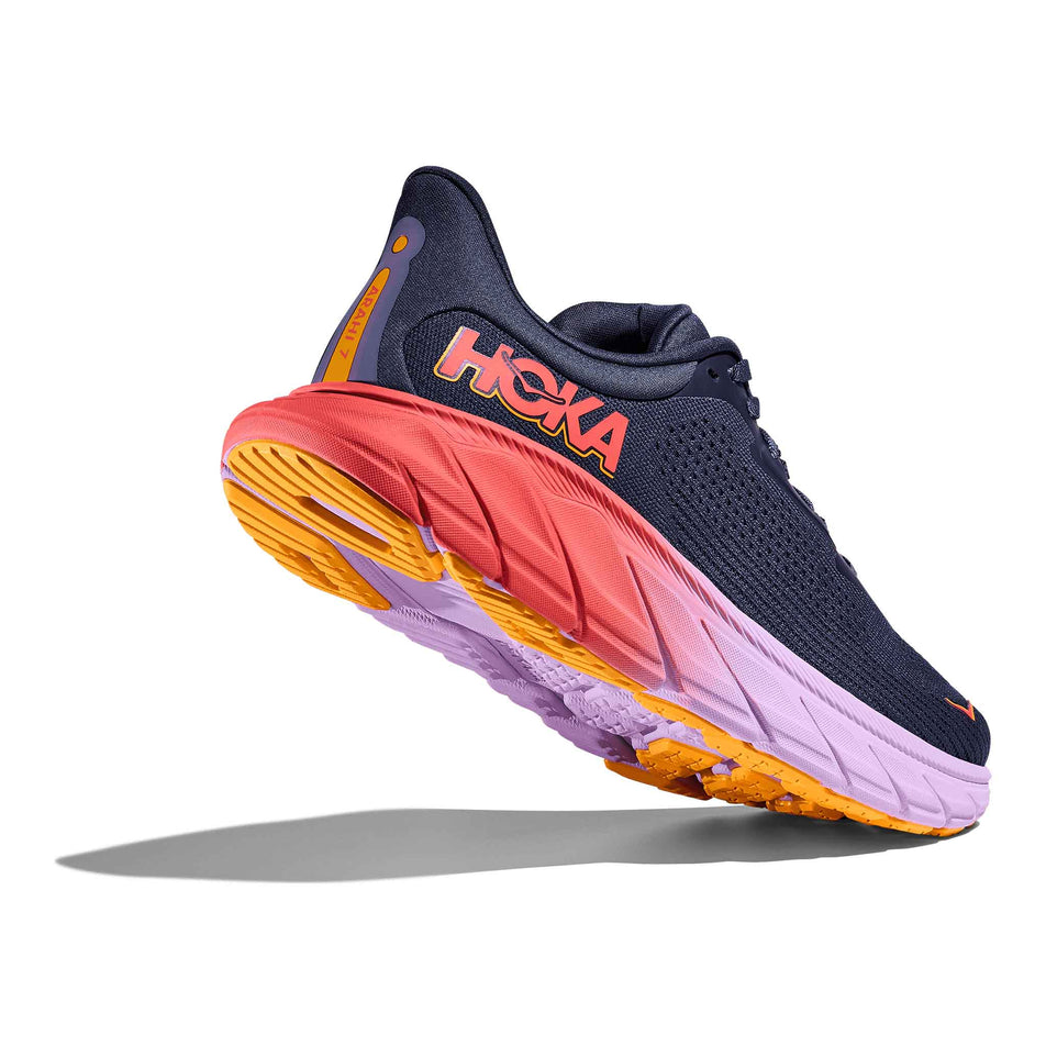 Lateral side of the right shoe from a pair of HOKA Women's Arahi 7 Running Shoes in the Nautical Dusk/Varsity Navy colourway. (8561688510626)