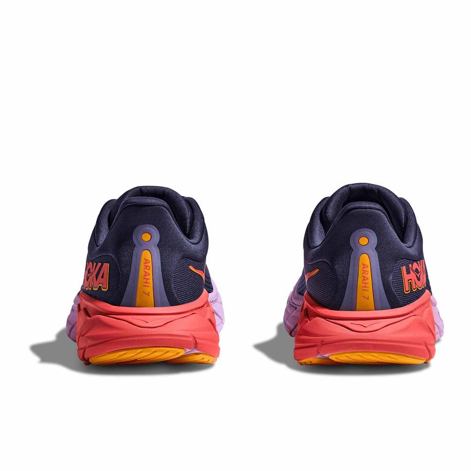 The back of a pair of HOKA Women's Arahi 7 Running Shoes in the Nautical Dusk/Varsity Navy colourway. (8561688510626)