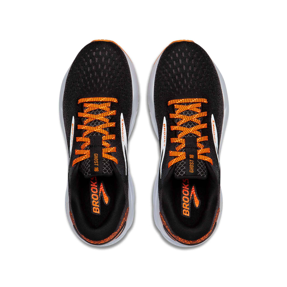 The uppers on a pair of Brooks Women's Ghost 16 Running Shoes in the Black/Orange/White colourway. (8519753826466)