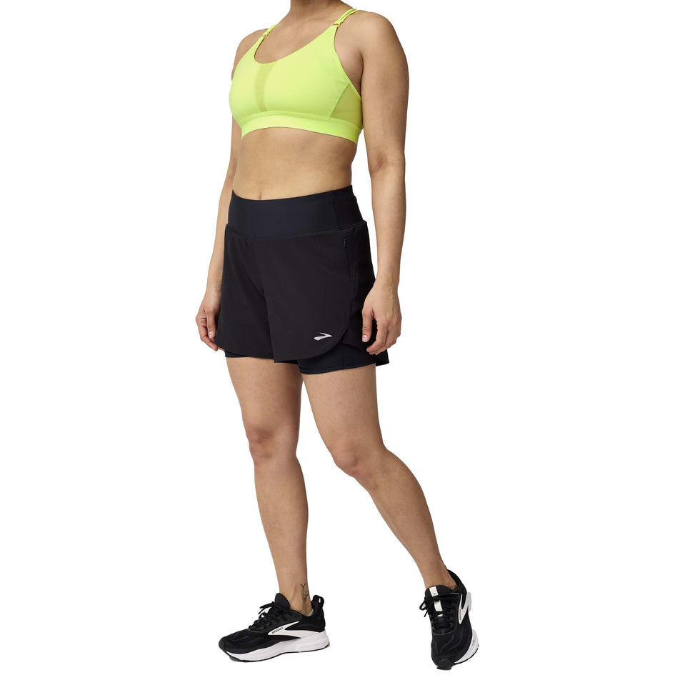 Front view of a model wearing the Brooks Women's Chaser 5