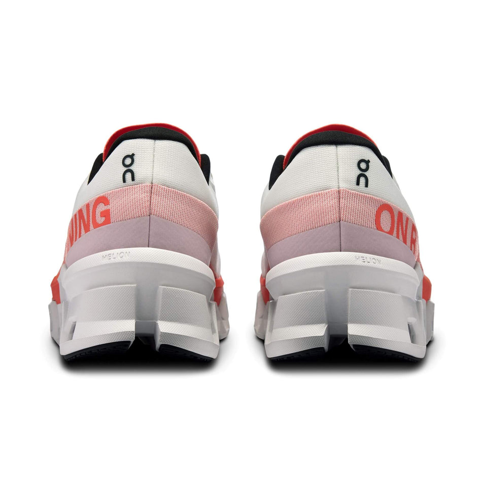 The back of a pair of On Men's Cloudmonster 2 Running Shoes in the White/Flame colourway (8407203446946)