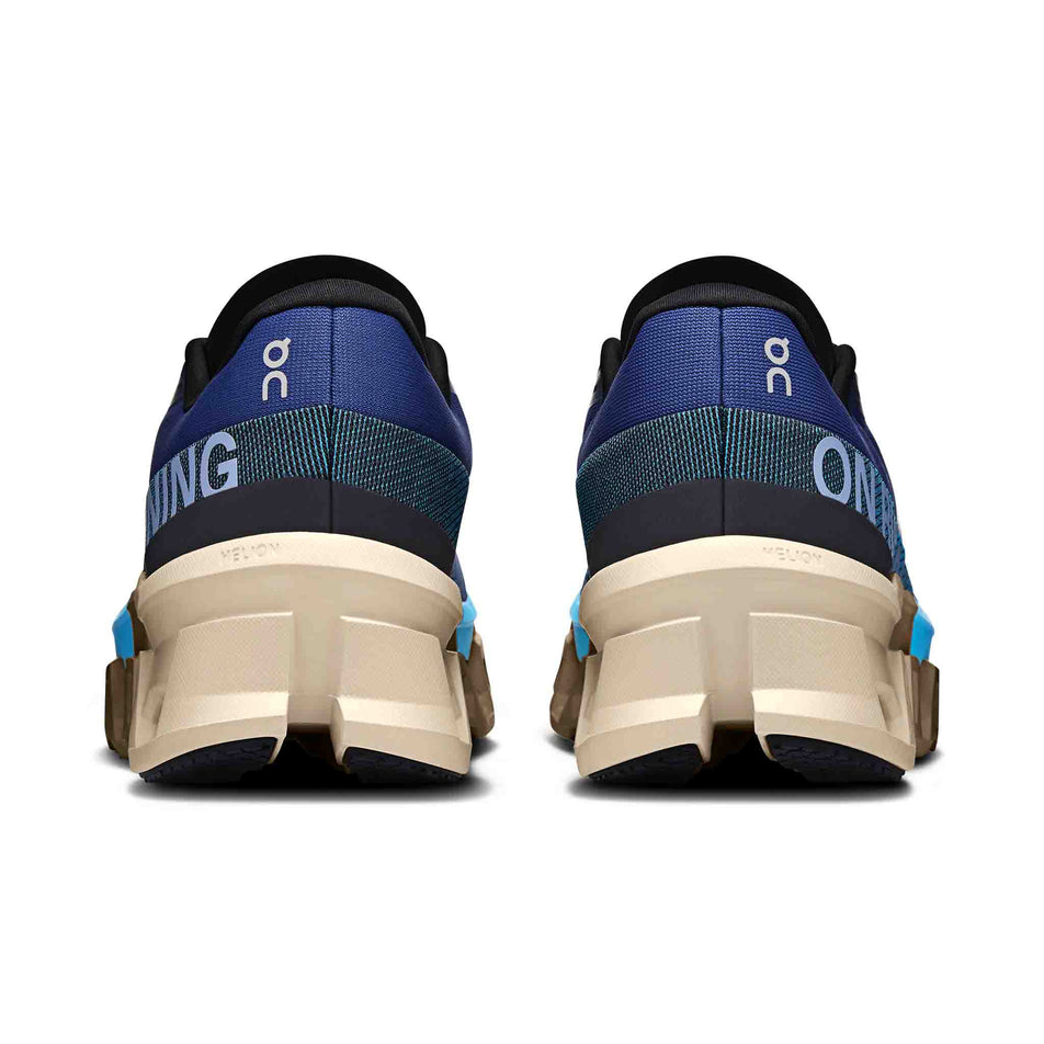 The back of a pair of On Men's Cloudmonster 2 Running Shoes in Tempest/Horizon colourway. (8562832769186)