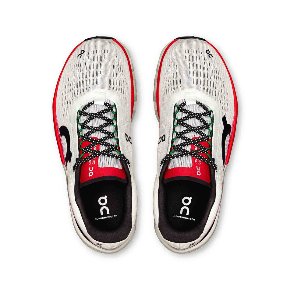 The uppers on a pair of On Women's Cloudmonster 2 Running Shoes in the Ivory/Red colourway. (8577870364834)