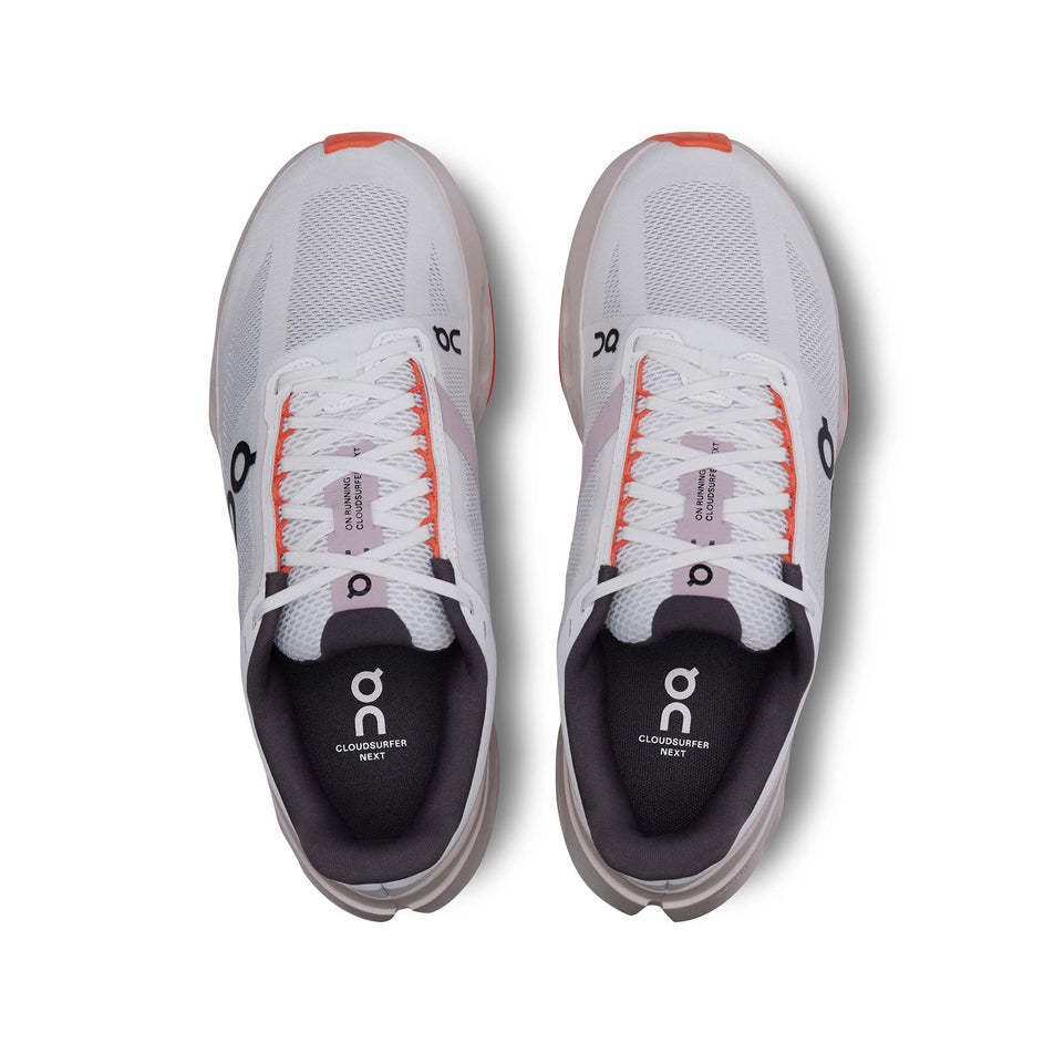 The uppers on a pair of On Women's Cloudsurfer Next Running Shoes in the White/Flame colourway (8444679520418)