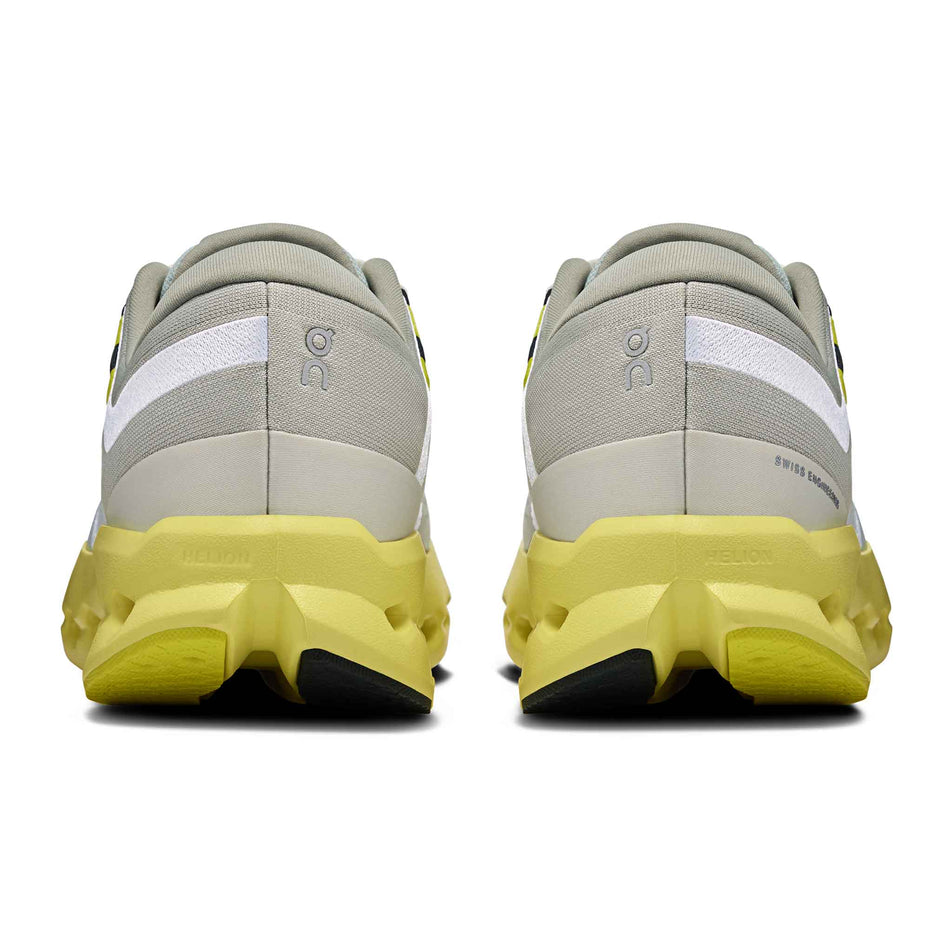 The back of a pair of On Women's Cloudsurfer 2 Running Shoes in the Glacier/Limelight colourway. (8577864859810)