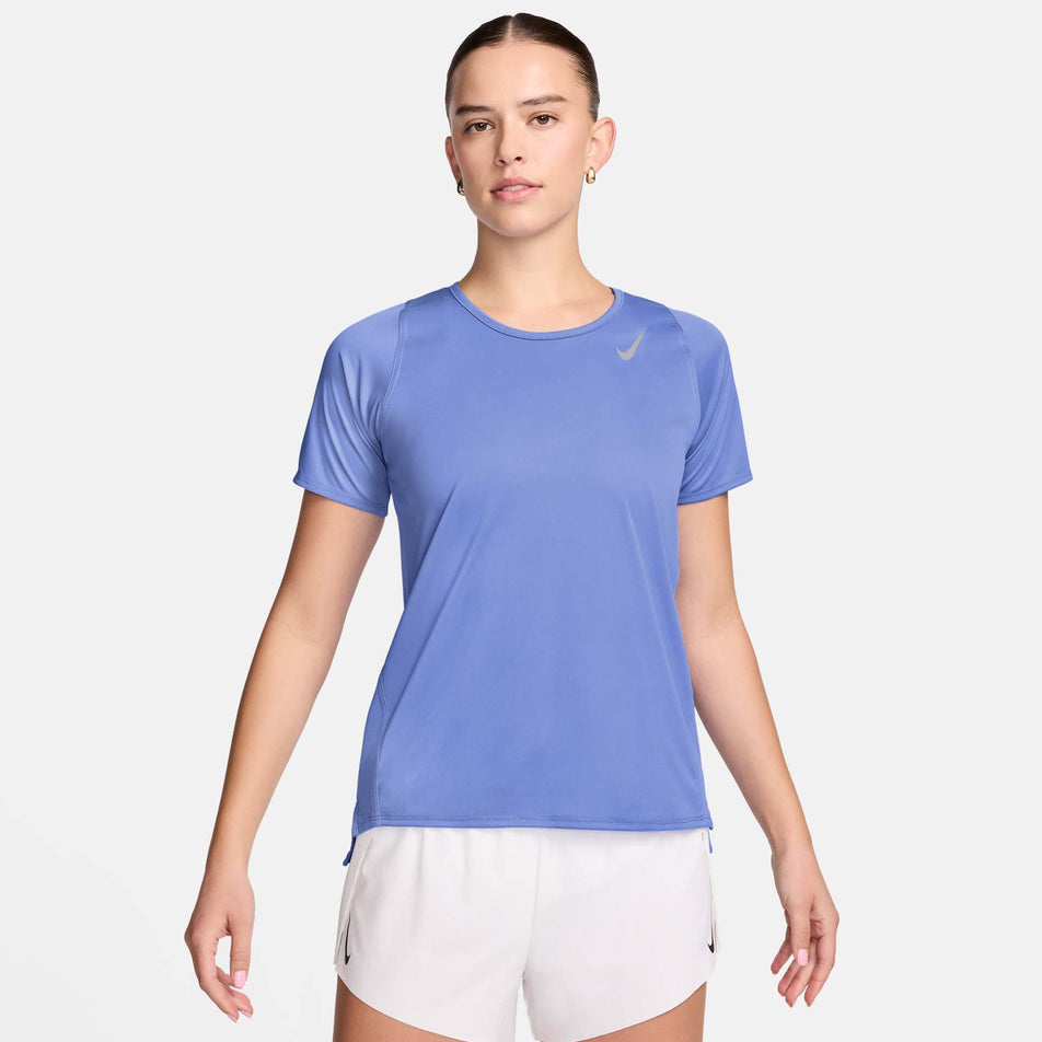 Front view of a model wearing a Nike Women's Dri-FIT Race Short-Sleeve Running Top in the Royal Pulse/Reflective Silver colourway. Model is also wearing White Nike shorts. (8495625240738)