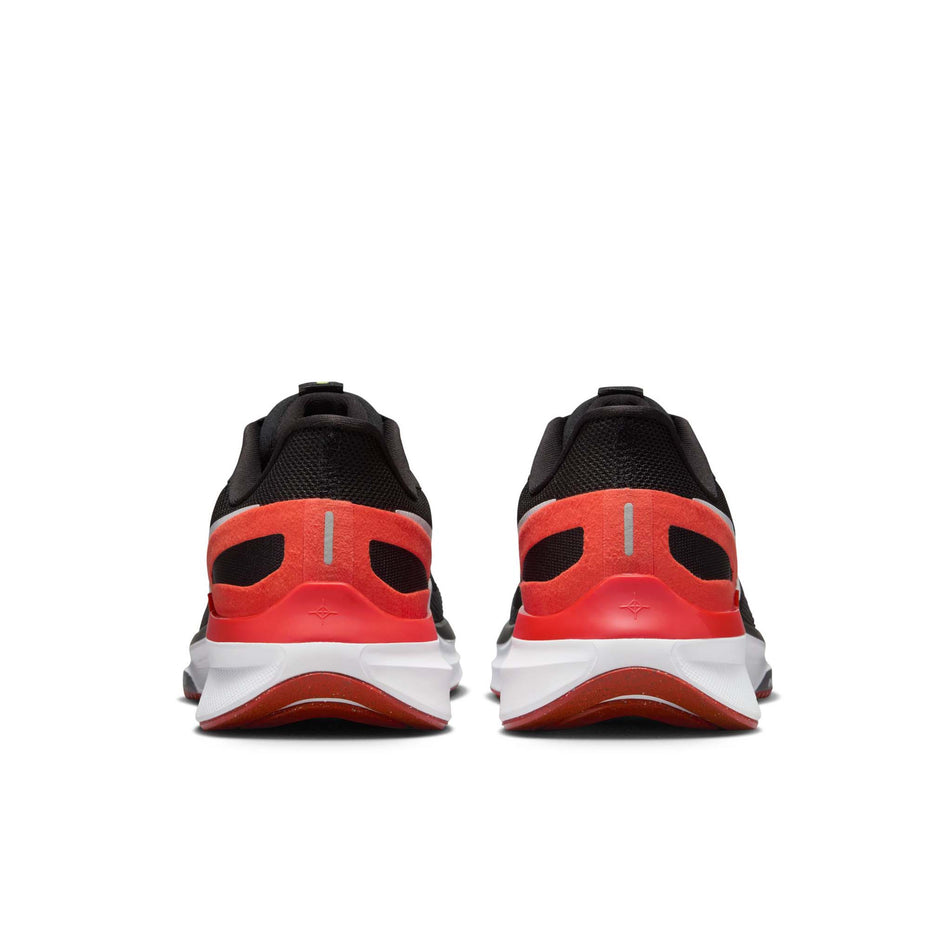 The back of a pair of Nike Men's Structure 25 Road Running Shoes in the Black/White-Picante Red-Anthracite colourway. (8558377435298)