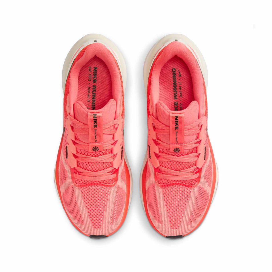 The uppers on a pair of Nike Women's Structure 25 Road Running Shoes in the Magic Ember/White-Sail-Apricot Agate colourway. (8558441529506)