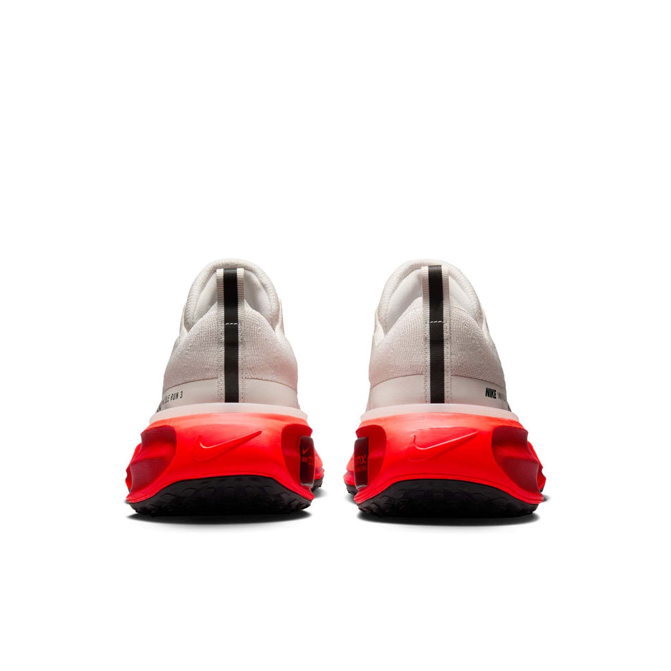 The back of a pair of Nike Men's Invincible 3 Road Running Shoes in the Phantom/Black-Light Crimson-University Red colourway. (8558368424098)