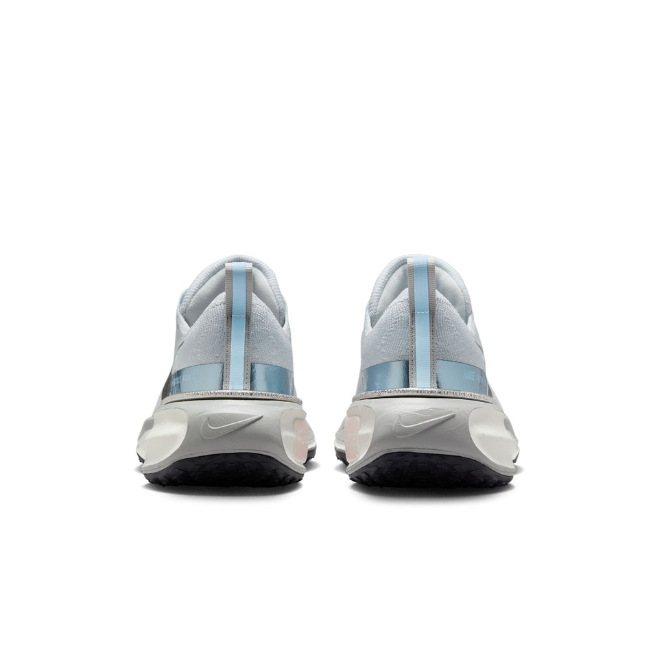 The back of a pair of Nike Women's Invincible 3 Road Running Shoes in the Pure Photon Dust/Light Smoke Grey-Psychic Blue colourway. (8558438252706)