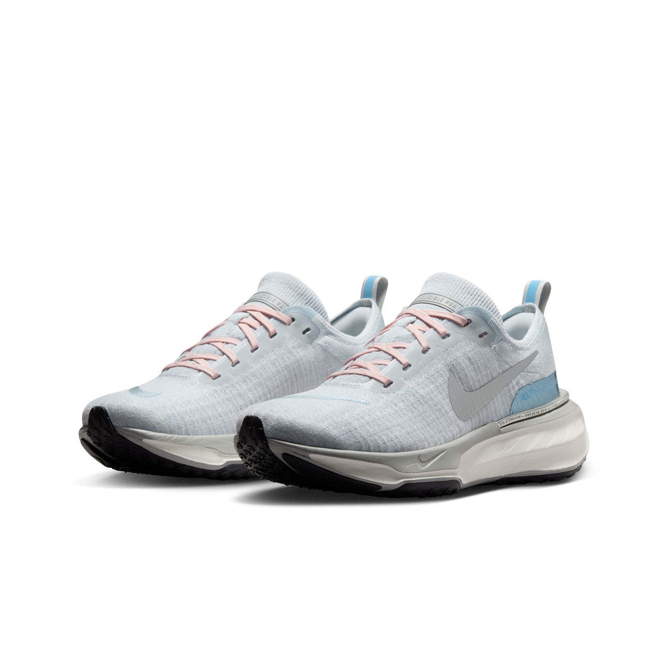 A pair of Nike Women's Invincible 3 Road Running Shoes in the Pure Photon Dust/Light Smoke Grey-Psychic Blue colourway. (8558438252706)