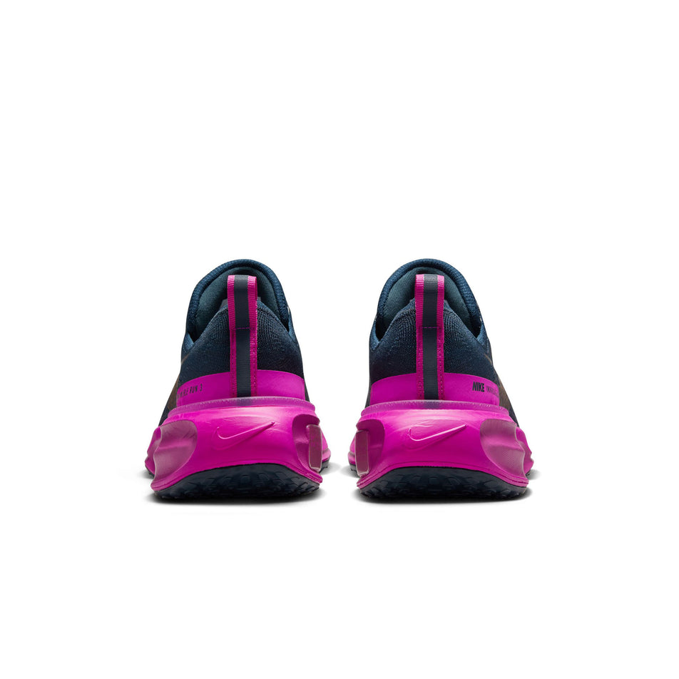 The back of a pair of Nike Women's Invincible 3 Road Running Shoes in the Armory Navy/Mtlc Red Bronzevivid Grape Grey colourway. (8503197335714)