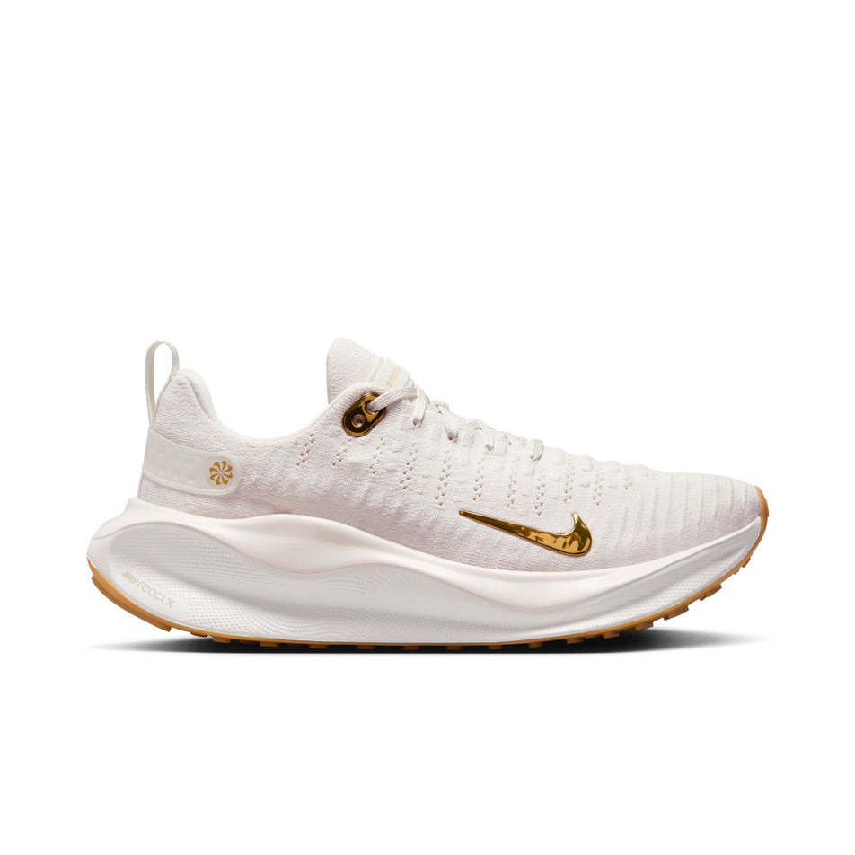 Lateral side of the right shoe from a pair of Nike Women's InfinityRN 4 Road Running Shoes in the Phantom/Metallic Gold-White colourway (8449418657954)