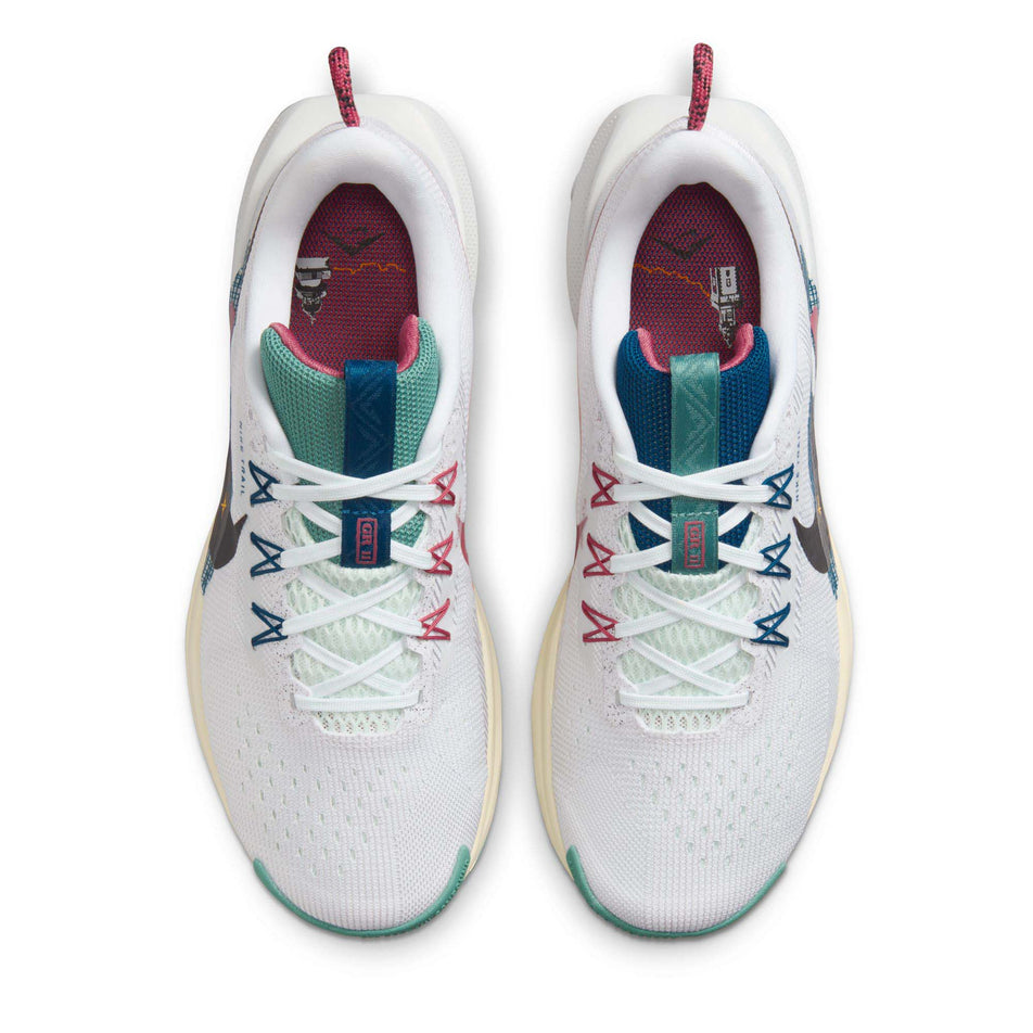 The uppers on a pair of Nike Women's ReactX Pegasus Trail 5 Running Shoes in the White/Black-Court Blue-Cedar colourway (8283662123170)