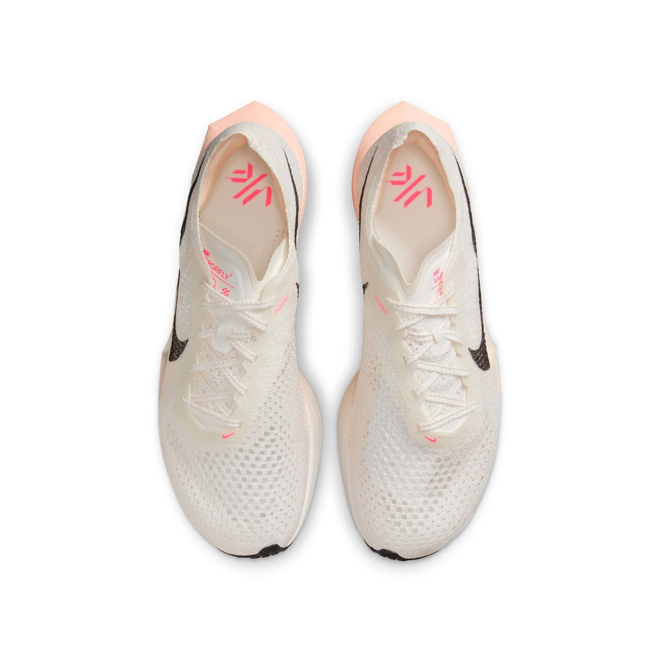 The uppers on a pair of Nike Women's Vaporfly 3 Road Racing Shoes in the Sail Black-Crimson Tint-Guava Ice colourway. (8503109288098)