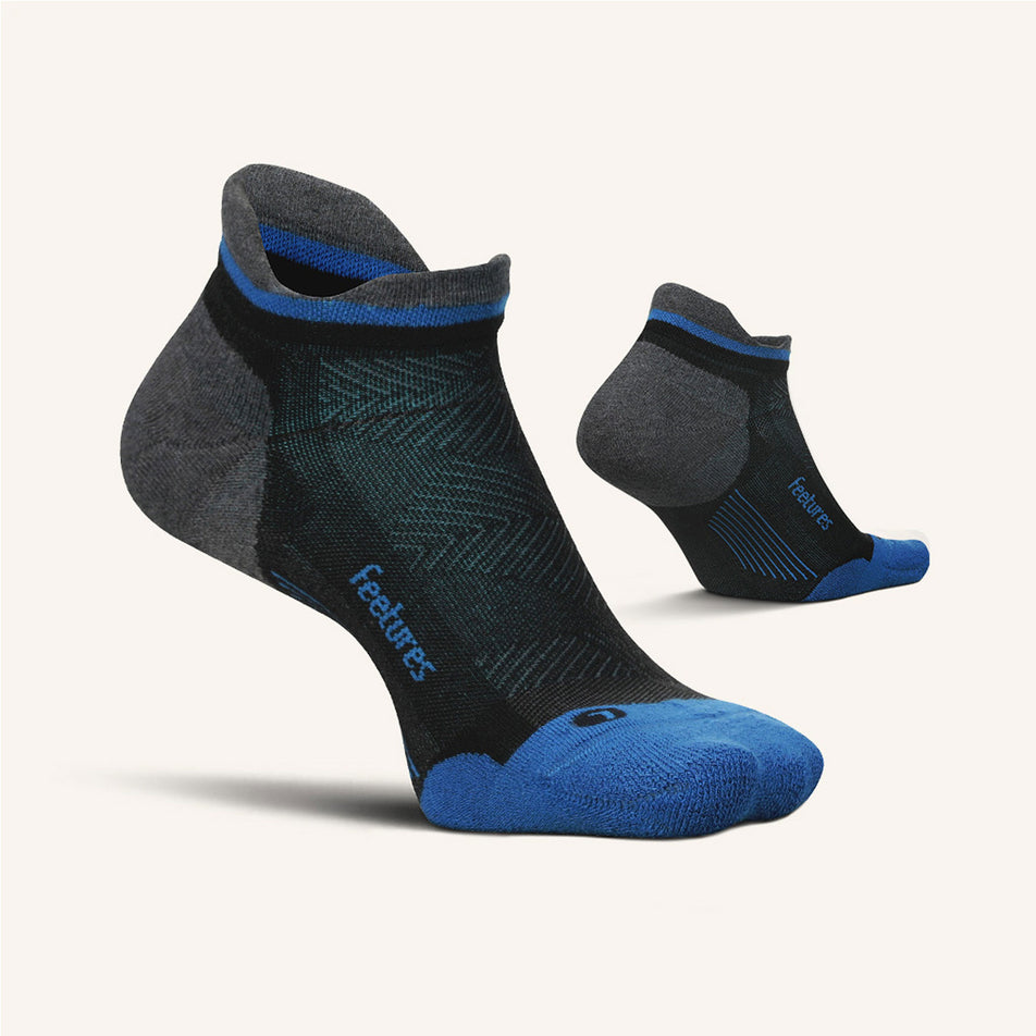 A pair of Feetures Unisex Elite Max Cushion No Show Tab running socks in the Tech Blue colourway (8149390098594)