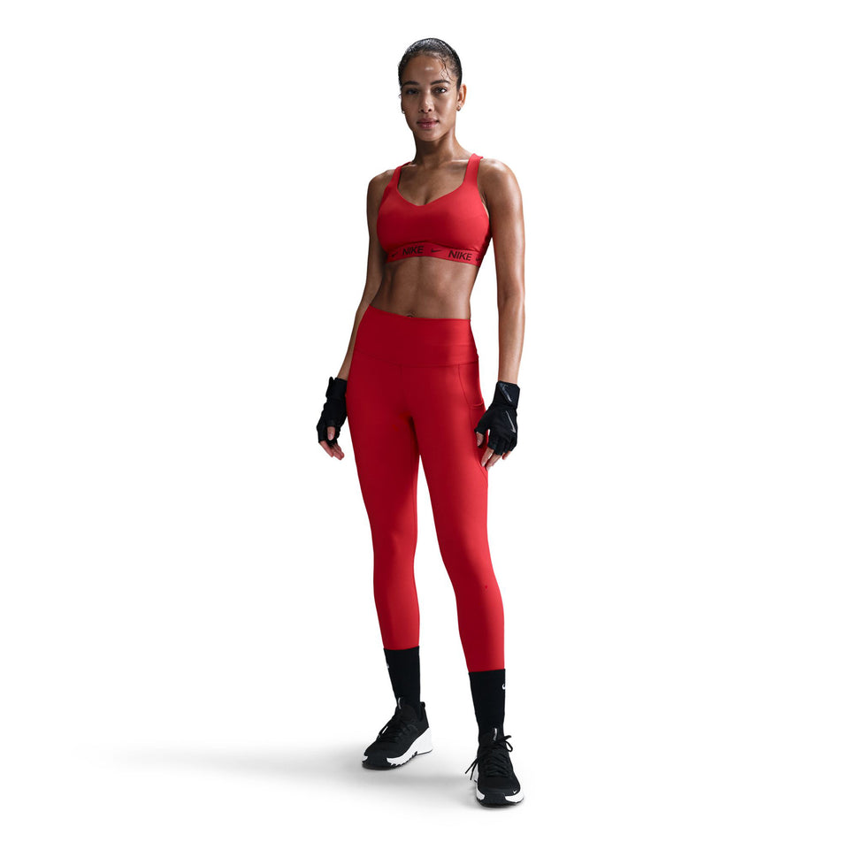 Front view of a model wearing a Nike Women's DrFIT Indy High Support Bra in the University Red/Dark Team Red colourway. (8560836477090)