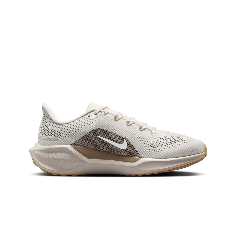 Medial side of the left shoe from a pair of Nike Women's Pegasus 41 Road Running Shoes in the Phantom/White-Mink Brown-Copper Moon colourway. (8558423376034)