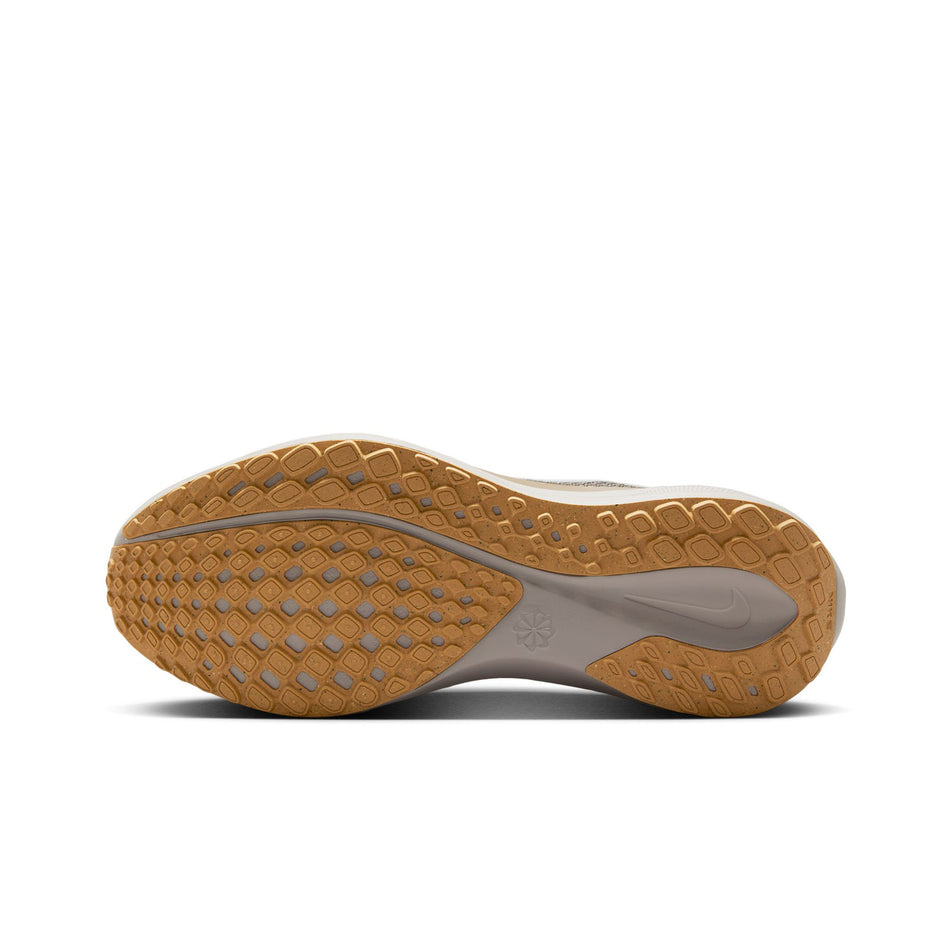 The outsole of the left shoe from a pair of Nike Women's Pegasus 41 Road Running Shoes in the Phantom/White-Mink Brown-Copper Moon colourway. (8558423376034)