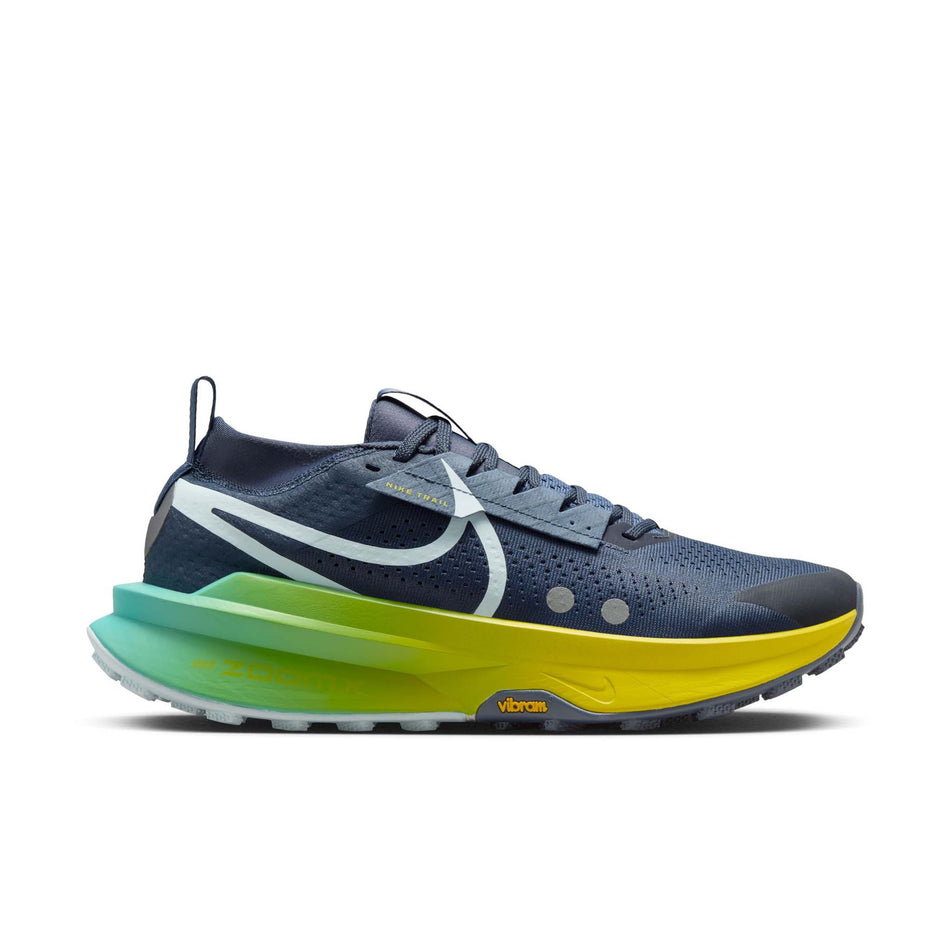 The lateral side of the right shoe from a pair of Nike Men's Zegama Trail 2 Running Shoes in the Thunder Blue/Glacier Blue-Diffused Blue colourway. (8570235715746)