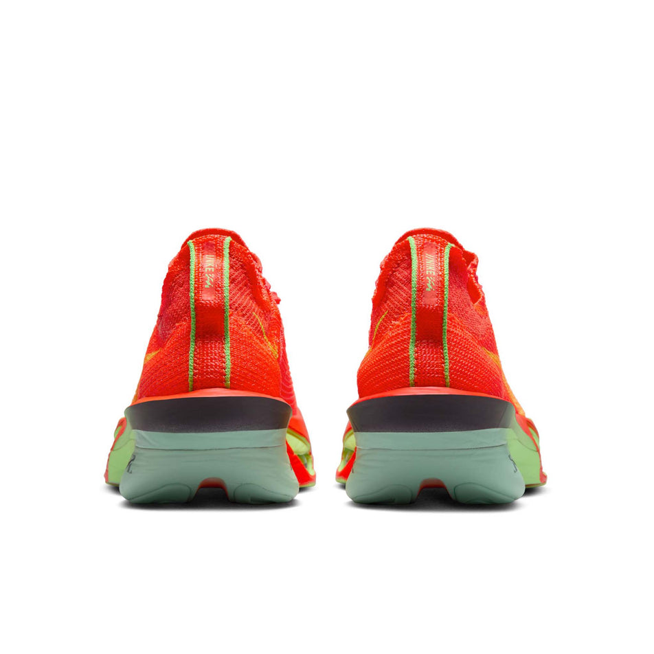 The back of a pair of Nike Women's Alphafly 3 Road Racing Shoes in the Bright Crimson/Cave Purple-Lime Blast colourway. (8574665293986)