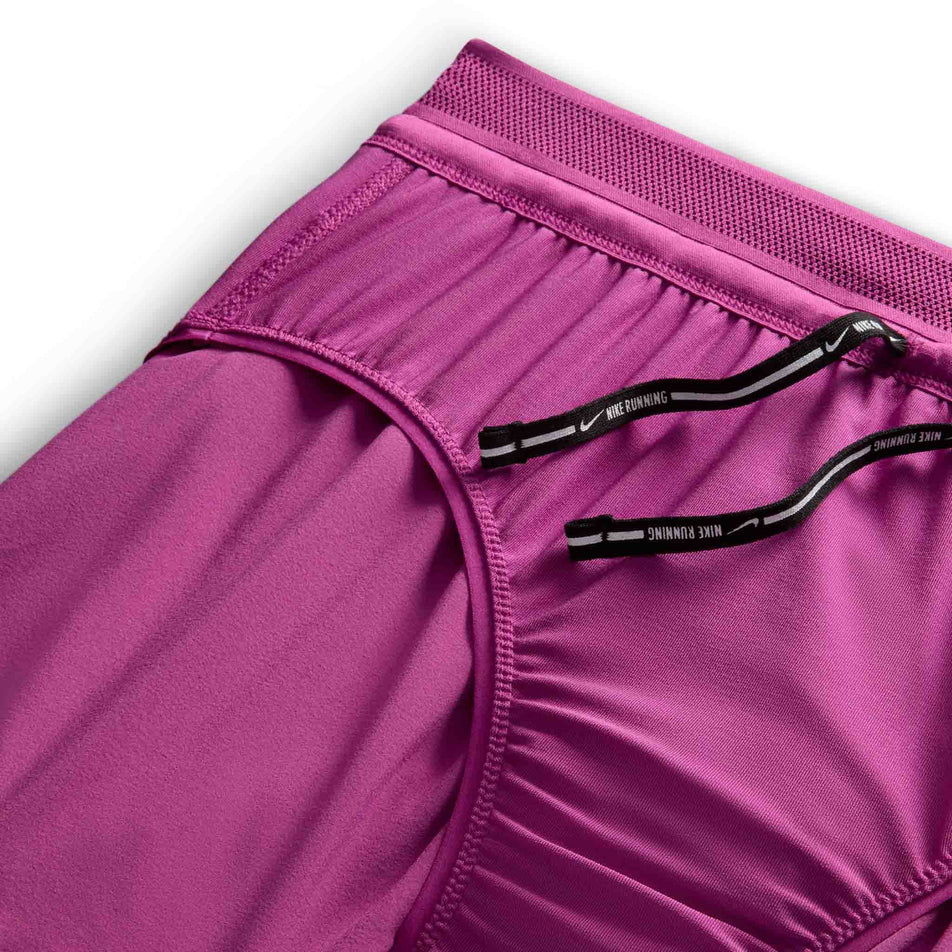 Close-up view the inner brief on a pair of Nike Women's AeroSwift Dri-FIT ADV Mid-Rise Brief-Lined 3