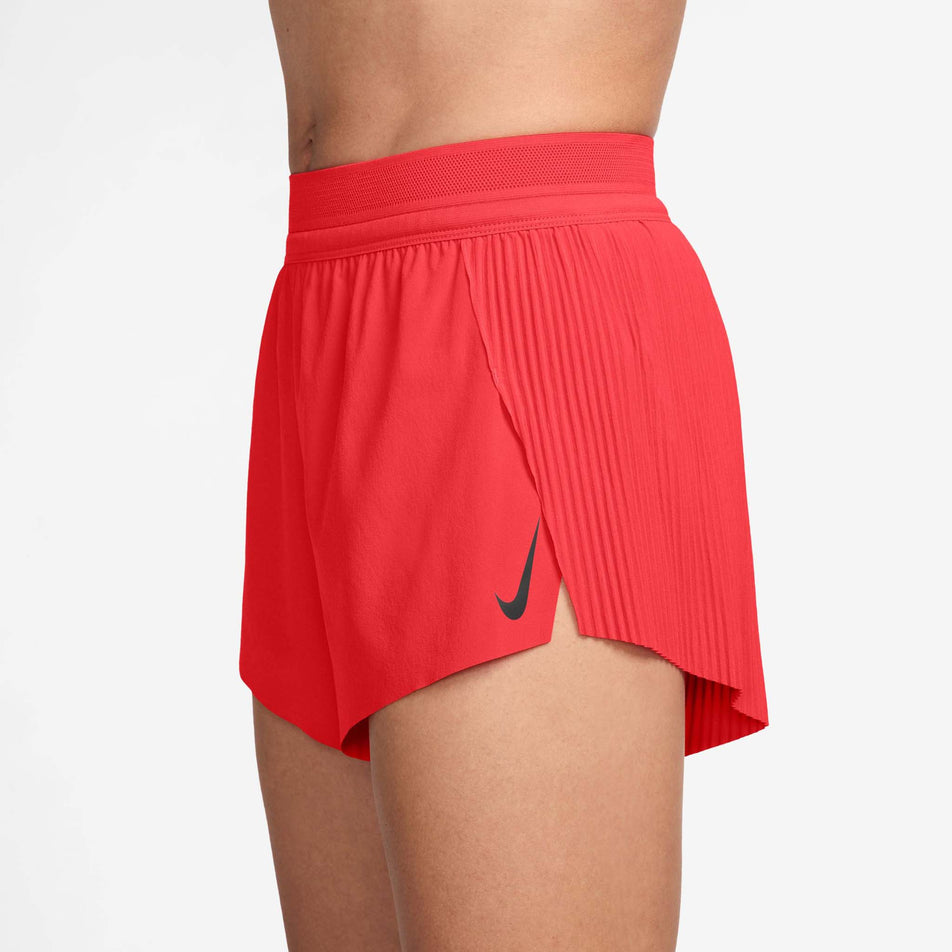 Angled view of the Nike Women's AeroSwift Dri-FIT ADV Mid-Rise Brief-Lined 3