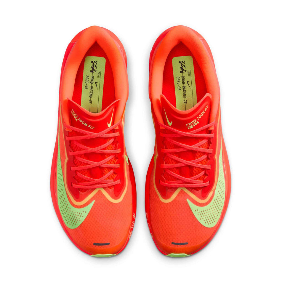 The uppers of a pair of Nike Men's Zoom Fly 6 Road Running Shoes in the Bright Crimson/Cave Purple-Lime Blast colourway. (8570169393314)