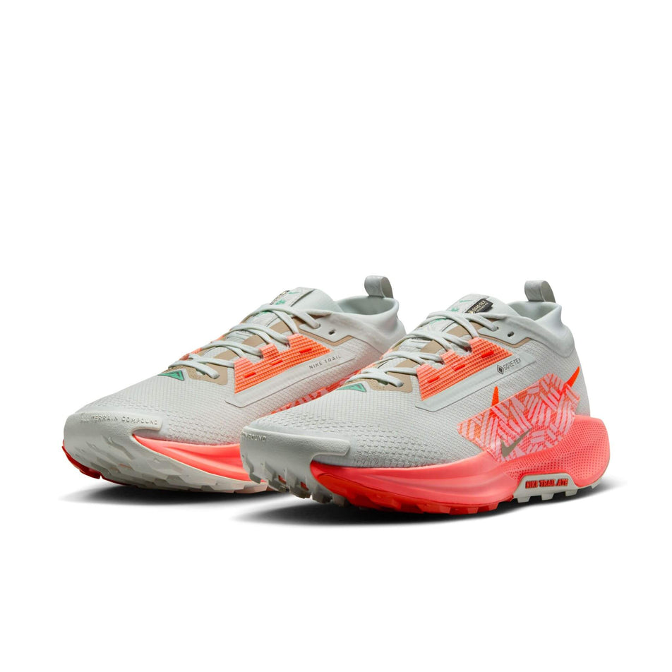 A pair of Nike Men's Pegasus Trail 5 GORE-TEX Waterproof Trail Running Shoes in the Light Silver/Hyper Crimson-Lt Wild Mango colourway. (8524547915938)