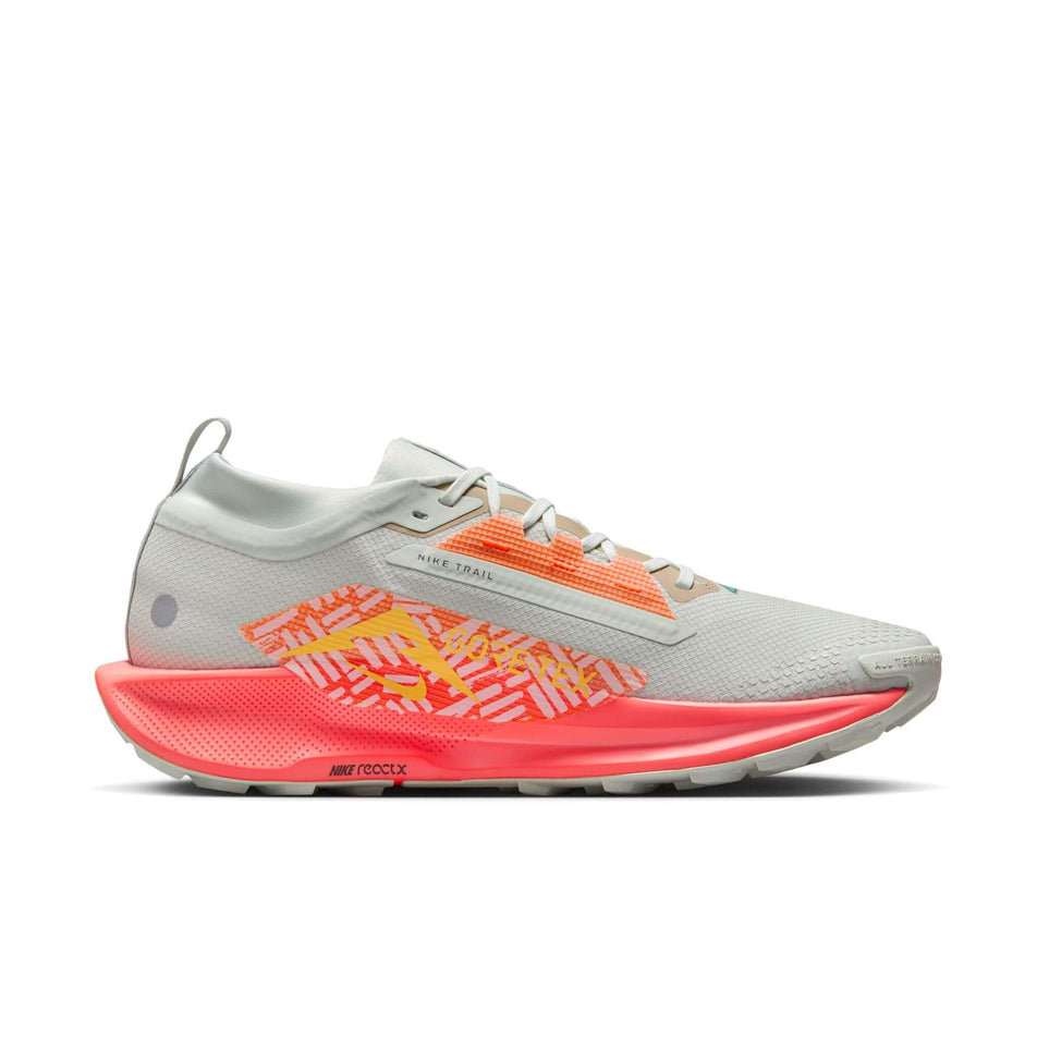 Medial side of the left shoe from a pair of Nike Men's Pegasus Trail 5 GORE-TEX Waterproof Trail Running Shoes in the Light Silver/Hyper Crimson-Lt Wild Mango colourway. (8524547915938)