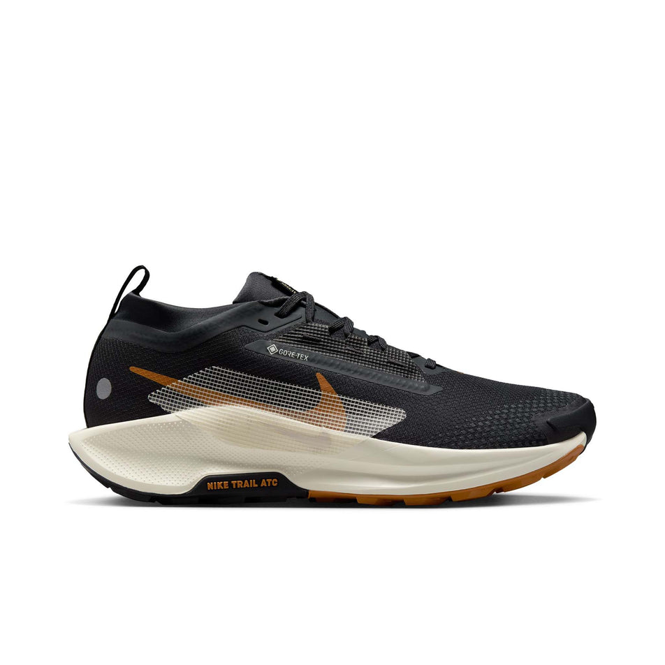 Lateral side of the right shoe from a pair of Nike Men's Pegasus Trail 5 GORE-TEX Waterproof Trail Running Shoes in the Off Noir/Pale Ivory-Black-Monarch colourway. (8558401847458)