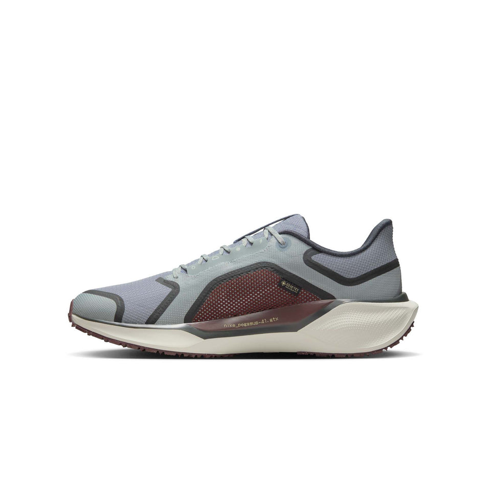 Medial side of the right shoe from a pair of Nike Men's Pegasus 41 GORE-TEX Waterproof Road Running Shoes in the Light Pumice/Ashen Slate-Burgundy Crush colourway. (8524543688866)