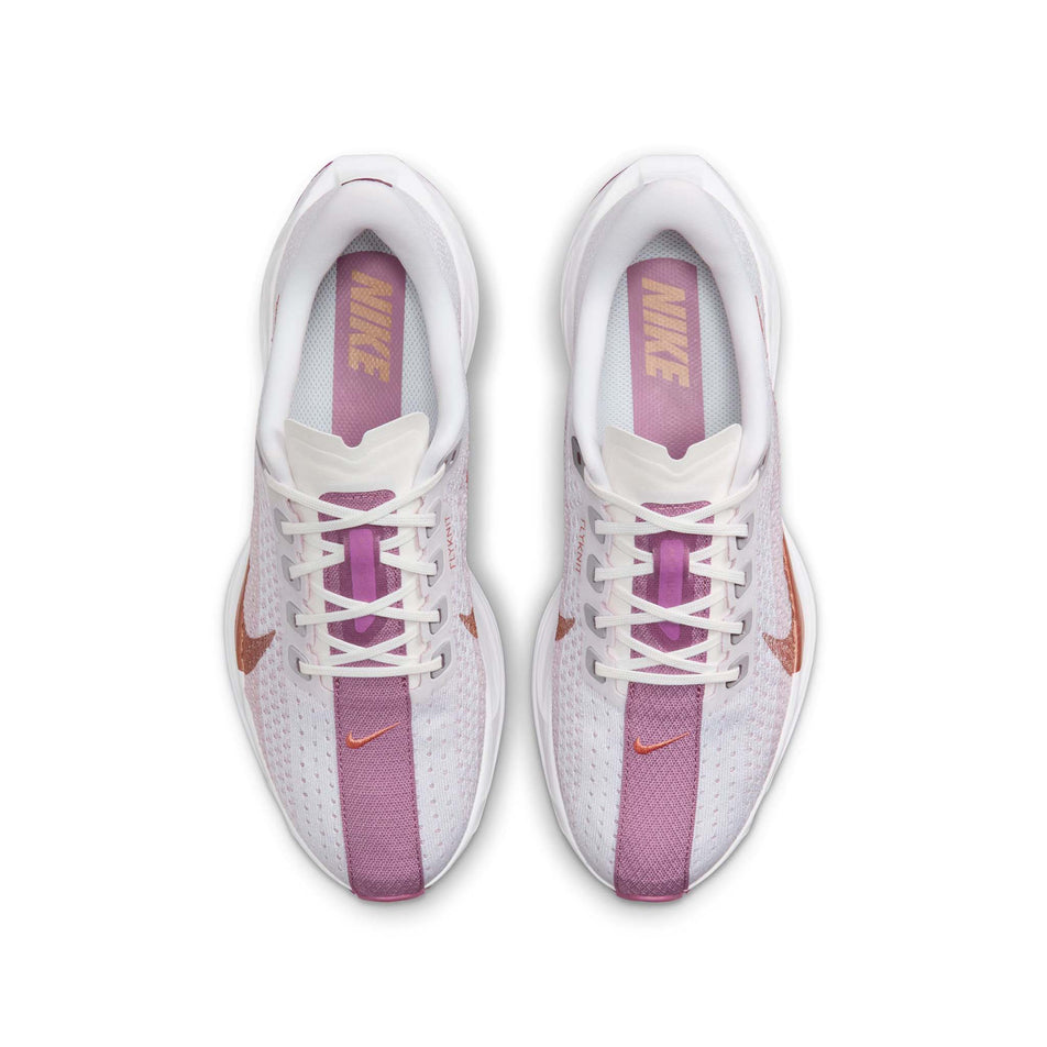 The uppers on a pair of Nike Women's Pegasus Plus Road Running Shoes in the White/Mtlc Red Bronze-Platinum Violet colourway. (8503170465954)