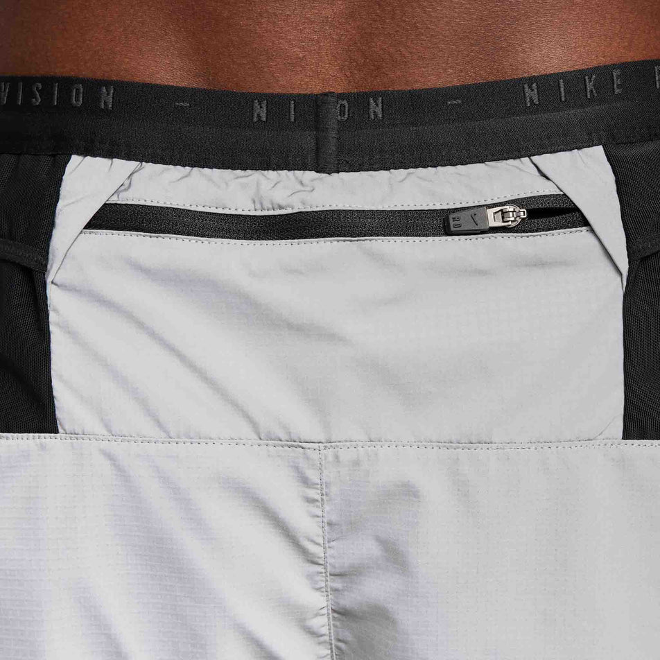 The zippered pocket on the back of a pair of Nike Men's Dri-FIT ADV Running Division 4