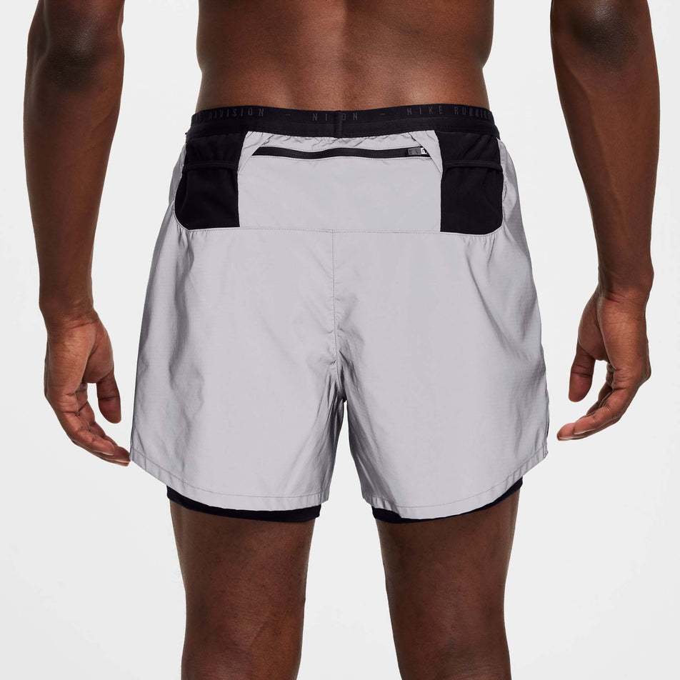 Back view of a model wearing a pair of Nike Men's Dri-FIT ADV Running Division 4