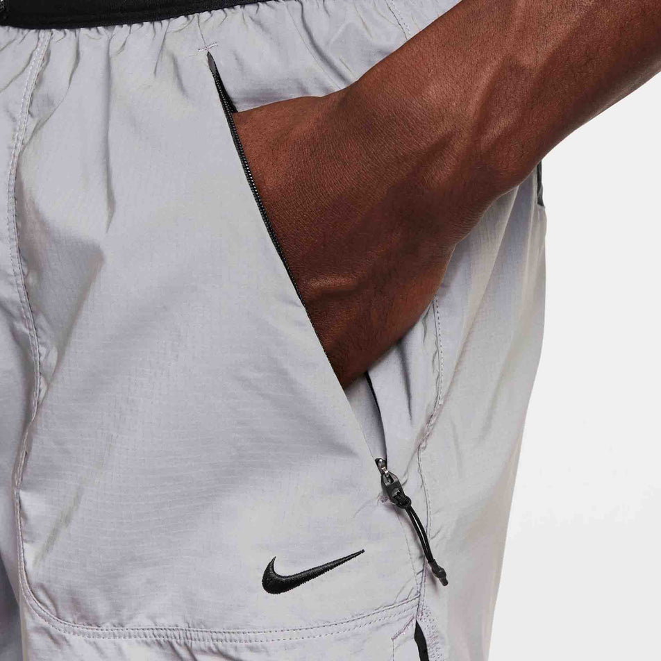 The zippered pocket on the left side of a pair of Nike Men's Dri-FIT ADV Running Division 4