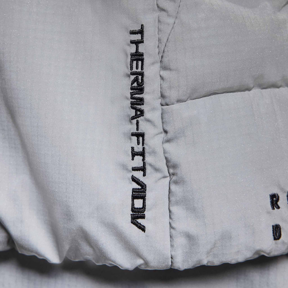 The Therma-Fit ADV branding on the Nike Men's Therma-FIT Running Division ADV Running Vest. (8497736941730)