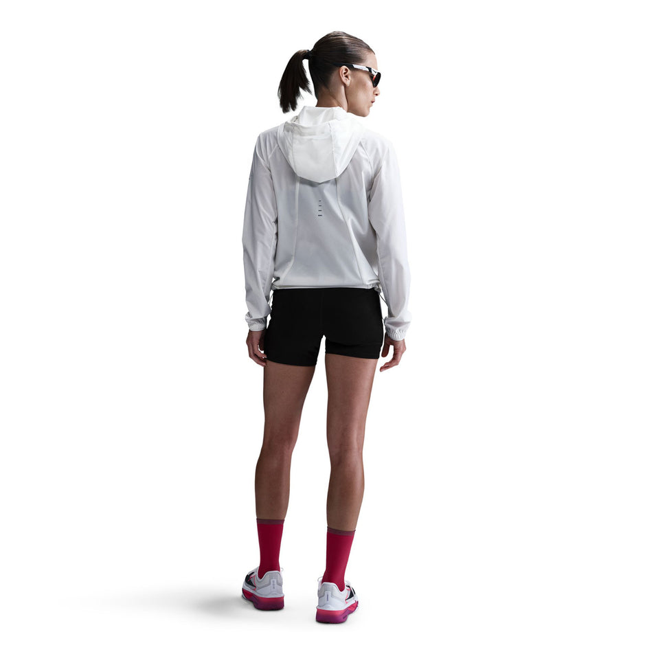 Back view of a model wearing Nike Women's Swift Dri-FIT High-Rise 4