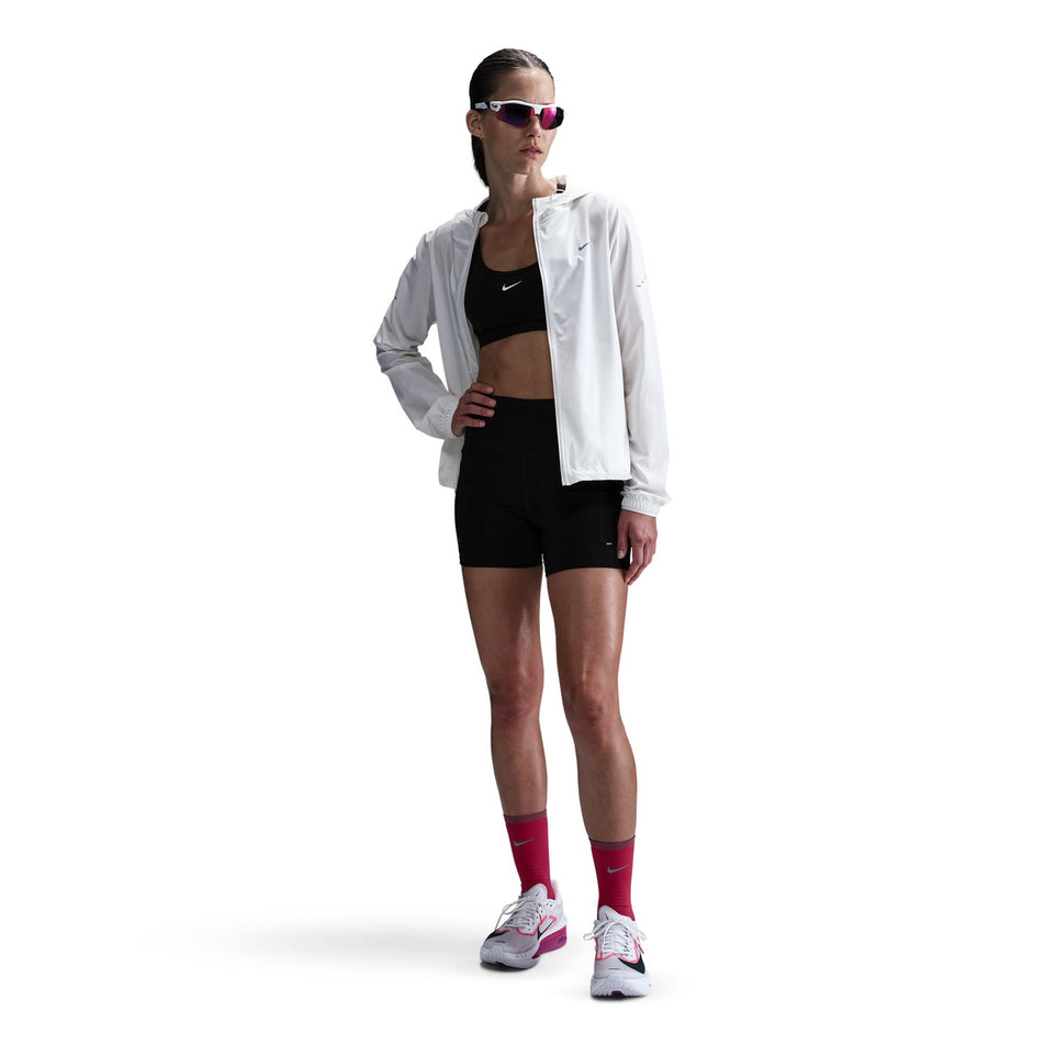 Front view of a model wearing a pair of Nike Women's Swift Dri-FIT High-Rise 4