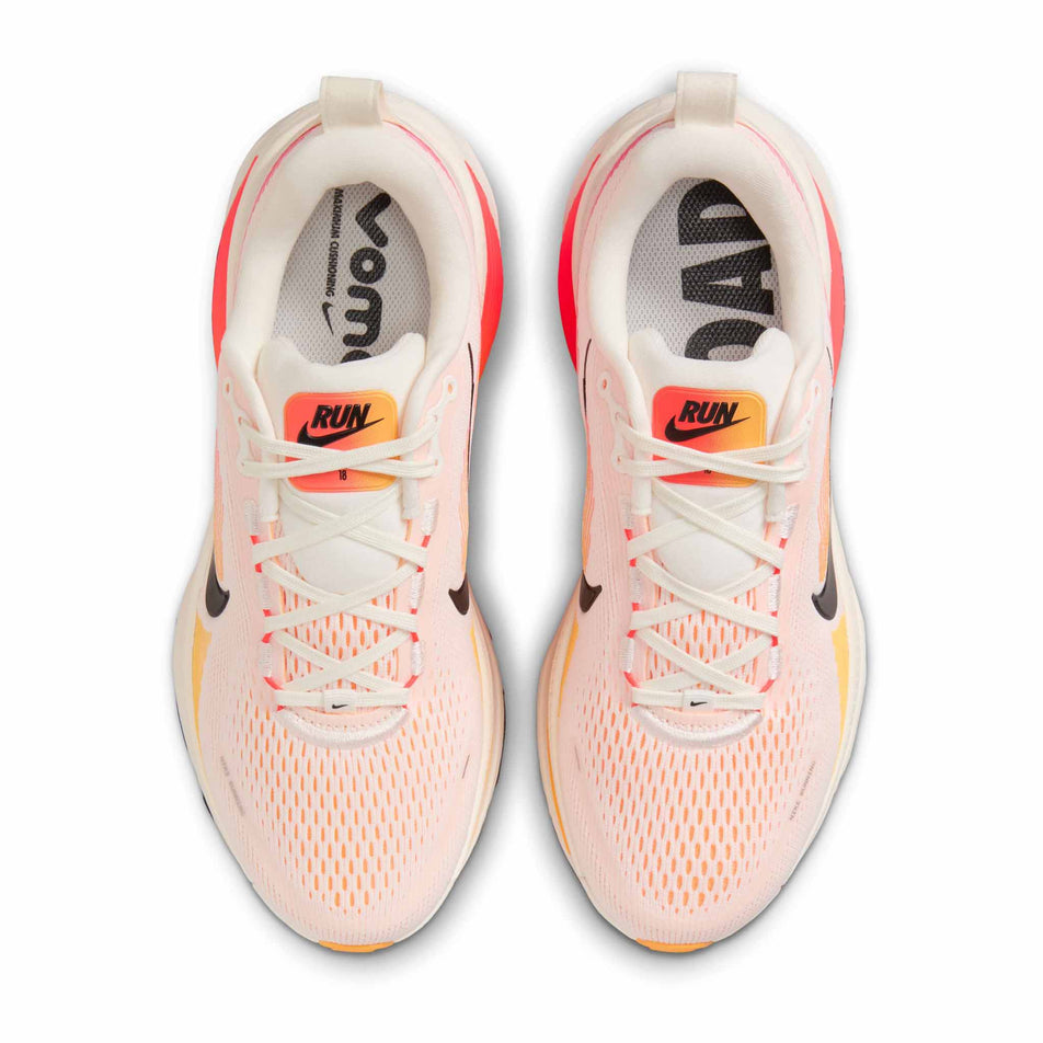 The uppers on a pair of Nike Women's Vomero 18 Road Running Shoes in the Sail/Black-Bright Crimson-Laser Orange colourway. (8574700945570)