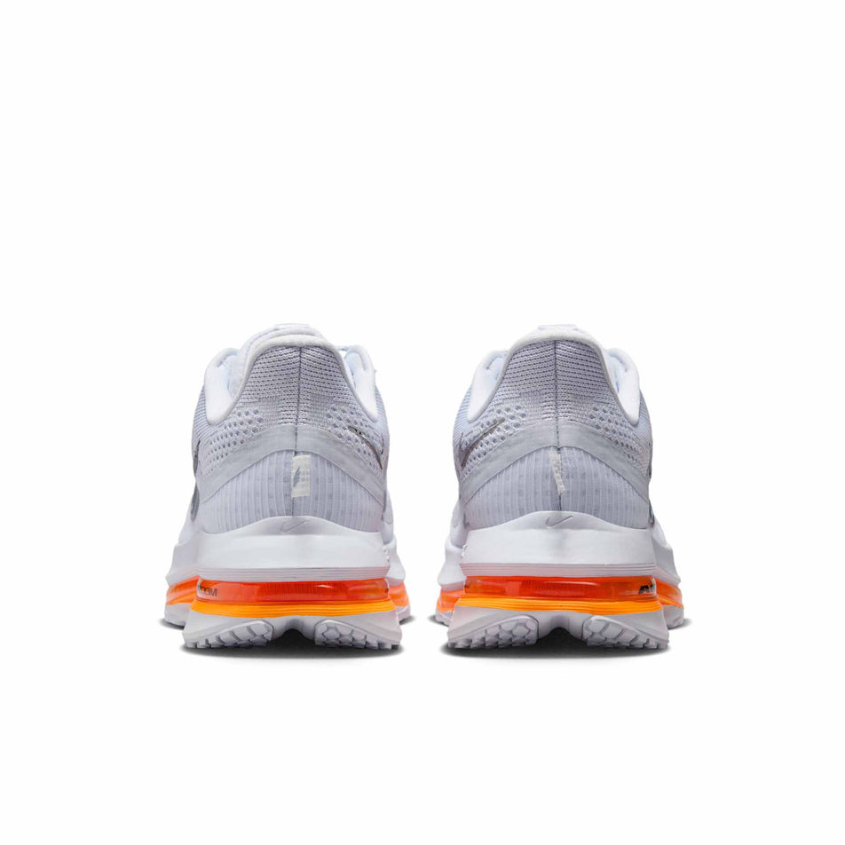 The back of a pair of Nike Women's Pegasus Premium Road Running Shoes in the Football Grey/Multi Color-Total Orange colourway. (8574593728674)