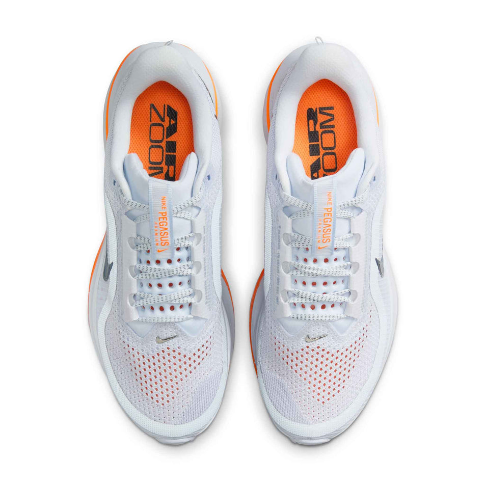 The uppers on a pair of Nike Women's Pegasus Premium Road Running Shoes in the Football Grey/Multi Color-Total Orange colourway. (8574593728674)