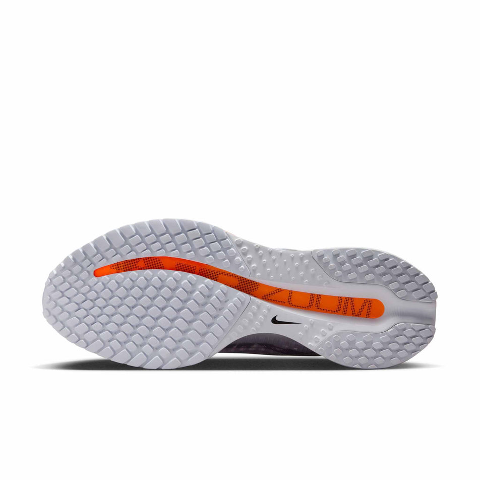 The outsole of the left shoe from a pair of Nike Women's Pegasus Premium Road Running Shoes in the Football Grey/Multi Color-Total Orange colourway. (8574593728674)