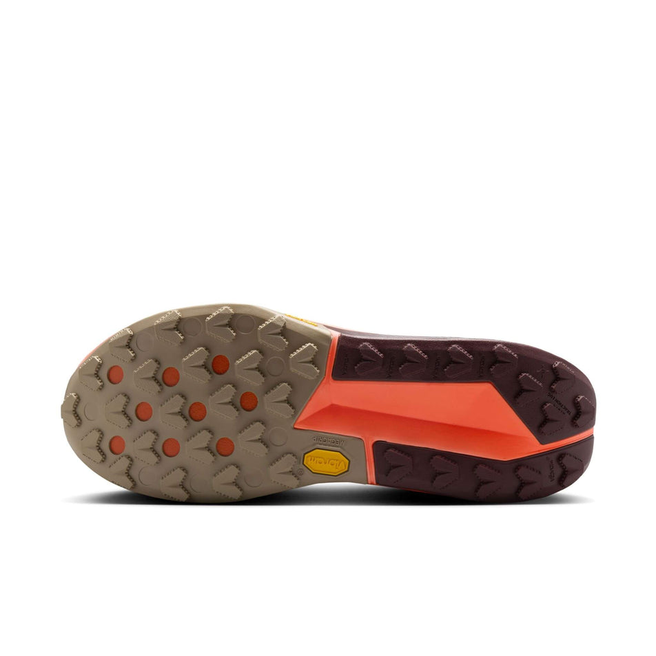 The outsole of the left shoe from a pair of Nike Men's Zegama Trail 2 Trail Running Shoes in the Khaki/White-Hyper Crimson-Burgundy Crush colourway. (8524550144162)